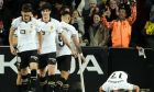 Valencia's Roman Yaremchuk, right, celebrates after scoring his side's second goal during the La Liga soccer match between Valencia and Real Madrid at the Mestalla Stadium in Valencia, Spain, Saturday, March 2, 2024. (AP Photo/Jose Breton)