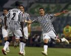 Udinese's Fabio Quagliarella, right, celebrates with teammate Cristian Zapata, of Colombia, after scoring during the UEFA Cup quarterfinal second leg soccer match between Udinese and Werder Bremen in Udine, northern Italy, Thursday, April 16, 2009. (AP Photo/Franco Debernardi)