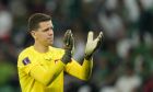Poland's goalkeeper Wojciech Szczesny applauds fans at the end of the World Cup group C soccer match between Poland and Saudi Arabia, at the Education City Stadium in Al Rayyan , Qatar, Saturday, Nov. 26, 2022. (AP Photo/Francisco Seco)