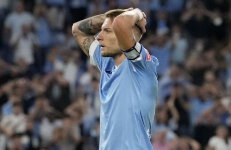 Lazio's Ciro Immobile reacts after failing to score during a Serie A soccer match between Lazio and Roma, at Rome's Olympic Stadium, Sunday, Sept. 26, 2021. (AP Photo/Andrew Medichini)