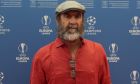 French former soccer star Eric Cantona poses to the photographers before the UEFA Champions League group stage draw at the Grimaldi Forum, in Monaco, Thursday, Aug. 29, 2019. (AP Photo/Daniel Cole)