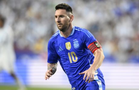 Argentina forward Lionel Messi in action during the first half of an international friendly soccer match against Guatemala, Friday, June 14, 2024, in Landover, Md. (AP Photo/Nick Wass)