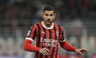 AC Milan's Theo Hernandez runs during the Serie A soccer match between AC Milan and Lecce at the San Siro stadium, in Milan, Italy, Friday, Sept. 27, 2024. (AP Photo/Antonio Calanni)