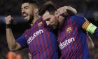 Barcelona's Lionel Messi, right and Barcelona's Luis Suarez celebrate after Messi scored his side's third goal during the Champions League round of 16, 2nd leg, soccer match between FC Barcelona and Olympique Lyon at the Camp Nou stadium in Barcelona, Spain, Wednesday, March 13, 2019. (AP Photo/Emilio Morenatti)