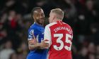 Arsenal's Oleksandr Zinchenko, right, speaks with Chelsea's Raheem Sterling at the end of the English Premier League soccer match between Arsenal and Chelsea at Emirates Stadium in London, Tuesday, April 23, 2024. (AP Photo/Kin Cheung)