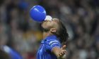 Chelsea's Christopher Nkunku celebrates after scoring his side's third goal during the Europa Conference League opening phase soccer match between Chelsea and Gent at Stamford Bridge in London, Thursday, Oct. 3, 2024. (AP Photo/Kin Cheung)