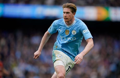 Manchester City's Kevin De Bruyne is in action during the English Premier League soccer match between Manchester City and Wolverhampton Wanderers at the Etihad Stadium in Manchester, England, Saturday, May 4, 2024. (AP Photo/Dave Thompson)