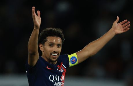 PSG's Marquinhos celebrates at the end of the French League One soccer match between Paris Saint Germain and Olympique de Marseille at Parc des Princes stadium in Paris, France, Sunday, Sept. 24, 2023. (AP Photo/Aurelien Morissard)