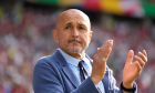 Italy's head coach Luciano Spalletti applauds before a round of sixteen match between Switzerland and Italy at the Euro 2024 soccer tournament in Berlin, Germany, Saturday, June 29, 2024. (AP Photo/Ariel Schalit)