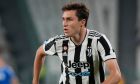 Juventus' Federico Chiesa controls the ball during a Serie A soccer match between Juventus and Empoli, at the Allianz stadium in Turin, Italy, Saturday, Aug. 28, 2021. (AP Photo/Luca Bruno)