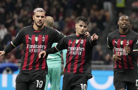 AC Milan's Brahim Diaz celebrates with his teammate Theo Hernandez after scoring his side's fourth goal during a Serie A soccer match between AC Milan and Sampdoria , at the San Siro stadium in Milan, Italy, Saturday, May 20, 2023. (AP Photo/Antonio Calanni)